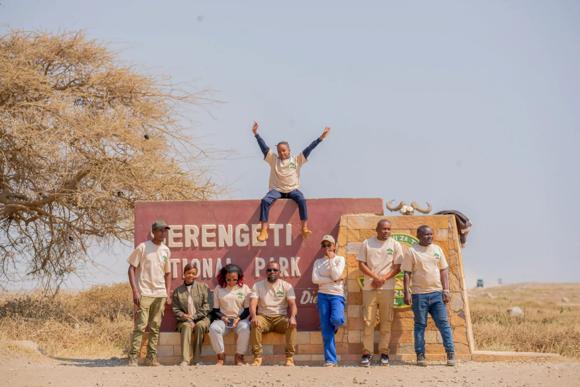 The Dastel Tour and Safaris team at the Serengeti National Park gate